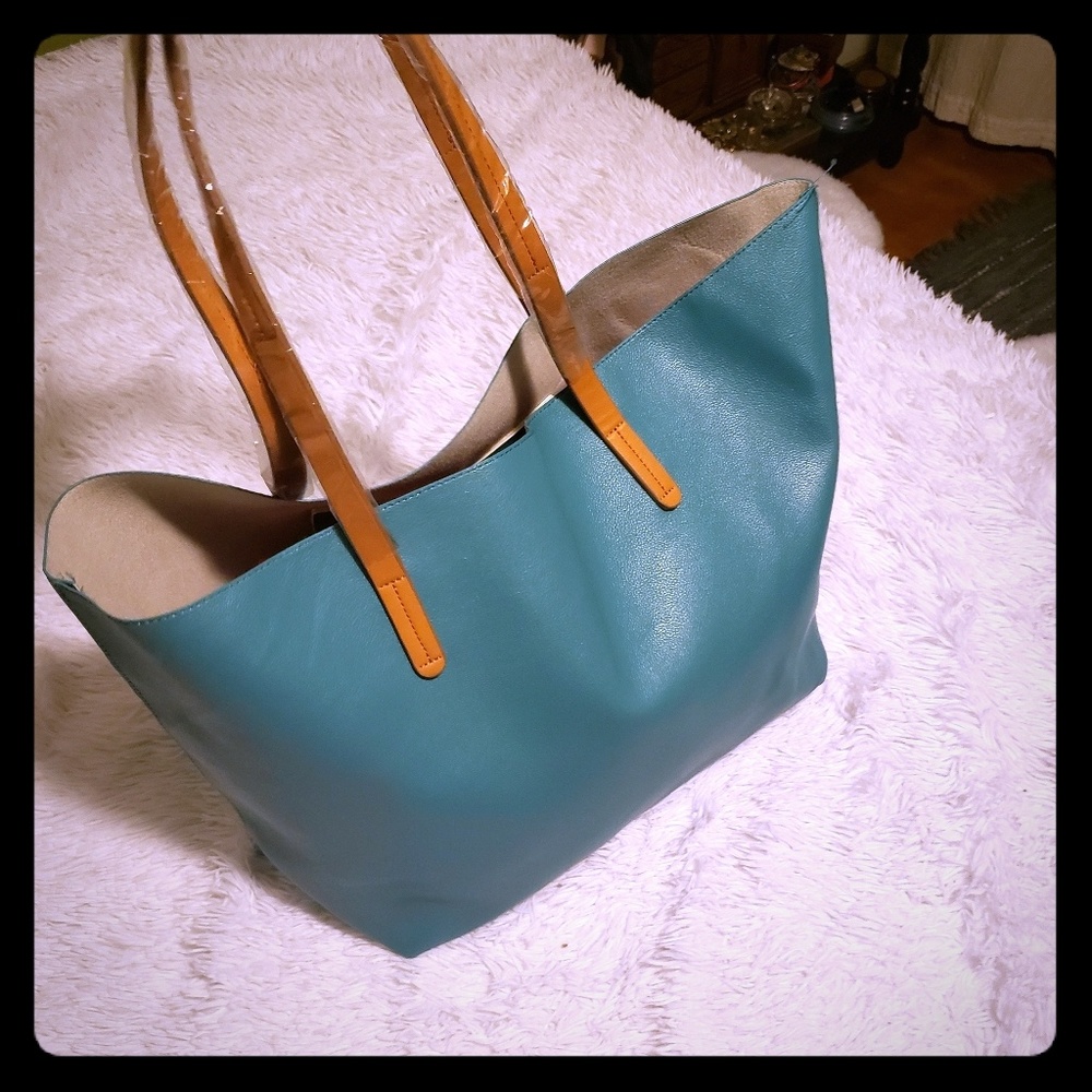 Oversized teal bucket purse